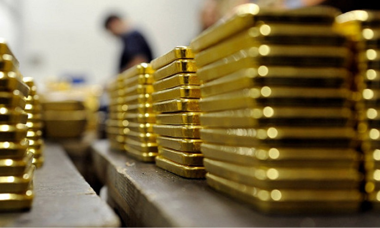 Какие факторы влияют на стоимость золотых мерных слитков Нацбанка?